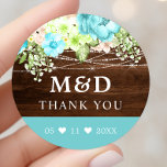 Aqua Floral String Lights Rustiek Dank je bruiloft Ronde Sticker<br><div class="desc">Aqua Floral String Lights Rustic Dank u bruiloft Classic ronde Sticker. Dit ontwerp heeft een rustieke houten achtergrond met aqua en mintgroene bloemen geaccentueerd met glinsterende snaarlampen. Perfect voor een winter of lente land bruiloft.</div>
