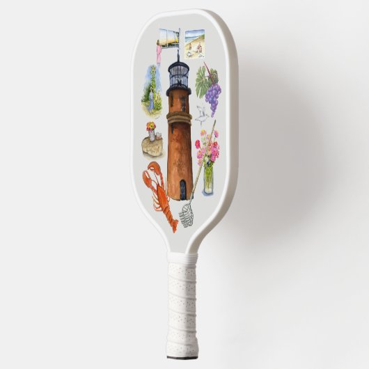 Aquinnah-medaille op een pickleball racket (Links)