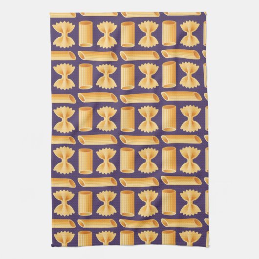 Array of various pasta shapes on a purple theedoek (Verticaal)