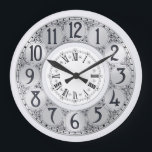 Art Deco Elegant stijlvol faux Silsex cadeau Grote Klok<br><div class="desc">Een  Art Deco-illustratie met faux-zilveren cirkels met zwarte randen,  waaromheen zwarte zwenkedels verschijnen,  is omgeven door een kleinere witte cirkel waarop Romeinse cijfers verschijnen.</div>