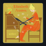 Art Deco Lady Auteur op schrijfbureau in Oranje Vierkante Klok<br><div class="desc">Deze gepersonaliseerde vierkante wandklok heeft een Art Deco stencil. Een vrouw in een oranje jurk zit aan een schrijfbureau met een opgezette pen terwijl een lamp naast haar schijnt. De achtergrond is donker goud. De vrouw ziet eruit alsof ze uit de 19e of vroege 20e eeuw komt. Het ontwerp heeft...</div>
