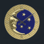 Art Deco Moon en Stars, Navy Blue en Gold Ronde Klok<br><div class="desc">Klok in een klassiek Art Deco moon en sterren ontwerp in geborsteld zilver met een enamel blauw/indigoachtergrond</div>