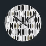 Art Deco Ovalen  Ronde Klok<br><div class="desc">Deze klok heeft een kunstdecoontwerp gemaakt van ovalen en halve ovalen in zwart,  wit en grijstinten.</div>