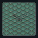 Art Deco stijlpatroon in blauwgroen groene kleur Vierkante Klok<br><div class="desc">Abstract geometrisch golvend patroon in Art Deco stijl op met blauwgroen groene en koperkleurige golven en ventilatordecoratie op donkergroene blauwgroen kleurenachtergrond</div>