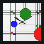 Art Deco Vierkante Klok<br><div class="desc">Deze muurklok heeft een kunstdeco-gekleurd glazen vensterontwerp van zwarte lijnen en rode, blauwe, groene vierkantjes en cirkels.</div>