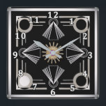 Art Deco Vierkante Klok<br><div class="desc">Met een nod naar het kunstdeco-tijdperk zal je decor een elegantie tonen van dagen voorbij. Vetkleurige, opvallende kleuren zijn een compliment voor veel designsmaken.</div>