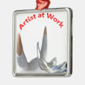 Artiest op het werk metalen ornament (Links)