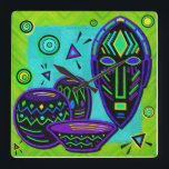 Artifact African Pop Art Vierkante Klok<br><div class="desc">Ook inbegrepen in multomappen met drie ringen, laptoptassen en bijpassende Macbook-sleeves voor Terug naar School, bandanas, petten, sleutelketens, canvas tassen, kruidenierswaren, tassen, charms en handpalmen, slangen, nagellak stickers, sjaals, leggings en shirten in kleding en accessoires, pitchers, placemats, onderzetters, papierluiers, bekers, mokken, vierkante magneten, vierkante magneten , posters en kussens voor...</div>