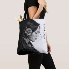 Artistic female profile with rose in monochrome tote bag
