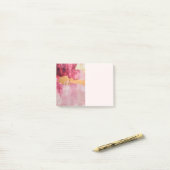 Artistieke borstel streken goud en roze post-it® notes (Op bureau)