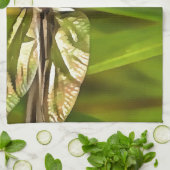 Artistieke limonade in bruin en geel op groen theedoek (Gevouwen)