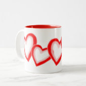 Artistisch rood roze hartsatroon op wit tweekleurige koffiemok (Voorkant links)
