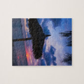 Aruba, silhouet van palapa op het strand op zonson legpuzzel (Horizontaal)