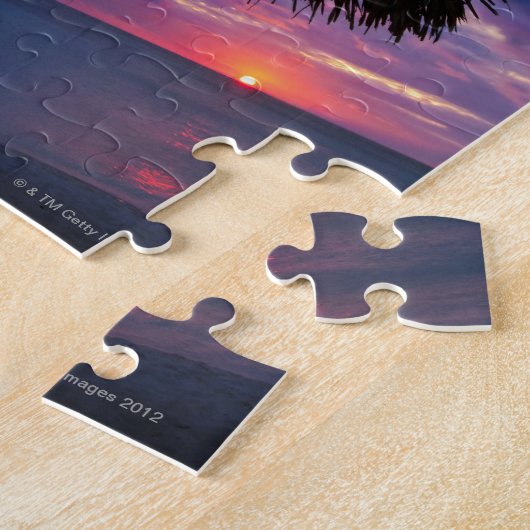 Aruba, silhouet van palapa op het strand op zonson legpuzzel (Zijkant)