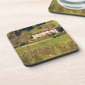 Aschuito, een werkzaam boerderij dat gasten accept drankjes onderzetter (Linkerzijde)