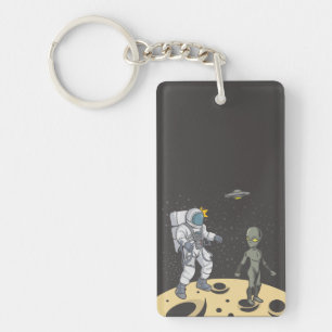 Astronaut en buitenaards sleutelhanger