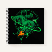 Astronaut op een raket rond Saturnus | Notitieboek (Voorkant)