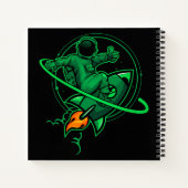 Astronaut op een raket rond Saturnus | Notitieboek (Achterkant)