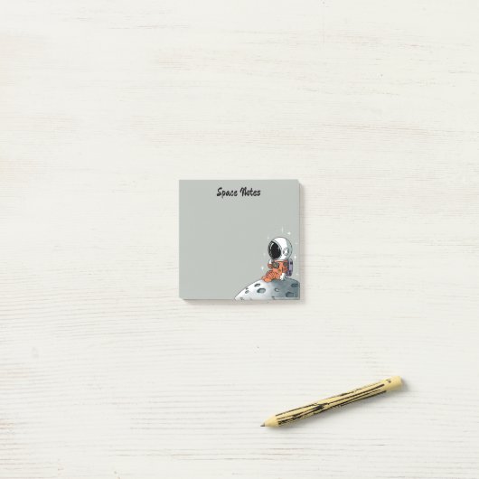 Astronaut, ruimtevaarder, ruimteaantekeningen post-it® notes (Op bureau)