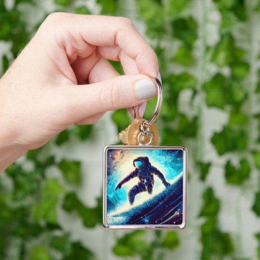 ASTRONAUT SURFING THE MILKY WAY SLEUTELHANGER (Hand)