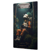 Astronaut zittend op een stoel klembord (Links)