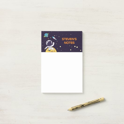 Astronaut zweeft in de ruimte post-it® notes (Op bureau)