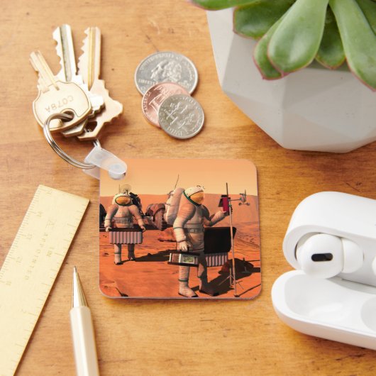 Astronauten zetten weerapparatuur op Mars in. Sleutelhanger (Bureau)