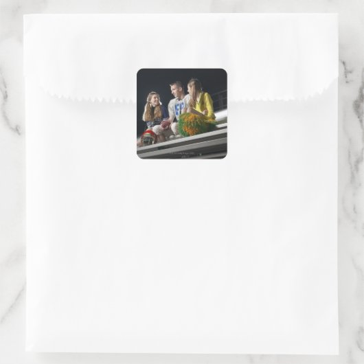 Atleten op tapijten vierkante sticker (Tas)