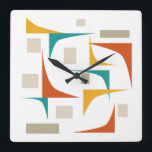 Atoomtijdperk geometrische hoeken midden eeuw vierkante klok<br><div class="desc">Voeg een pop kleur toe aan je muur met deze funky mid century moderne klok! Het beschikt over de leuke kleuren van blauwgroen blauw,  verbrand sinaasappel,  tan en geelachtige oranje geometrische vormen.</div>