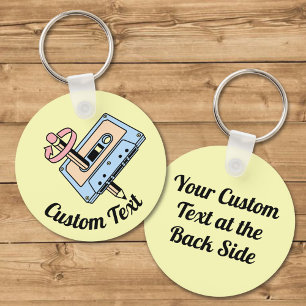 Audiocassette met potlood sleutelhanger