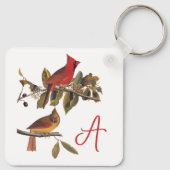 Audubon kardinaal paar in wilde amandelboom sleutelhanger (Achterkant)