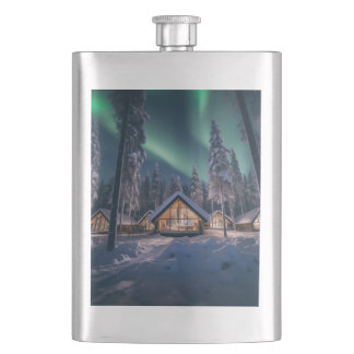 Aurora borealis boven winterhut flacon