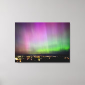 Aurora Borealis over stadslichten Canvas Afdruk (Voorkant)