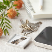 Australian Shepherd (10 maanden oud) met een Sleutelhanger (Zijkant)