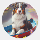 Australian Shepherd op Paddle: Een Schilderachtig Ronde Sticker (Voorkant)