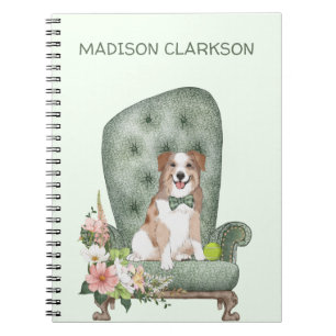 Australian Shepherd over het Notitieboek van de vo