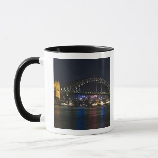 Australië, Sydney. Sydney haven 's nachts. Mok (Links)