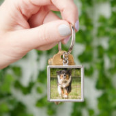 Australische herder die met bal speelt sleutelhanger (Hand)