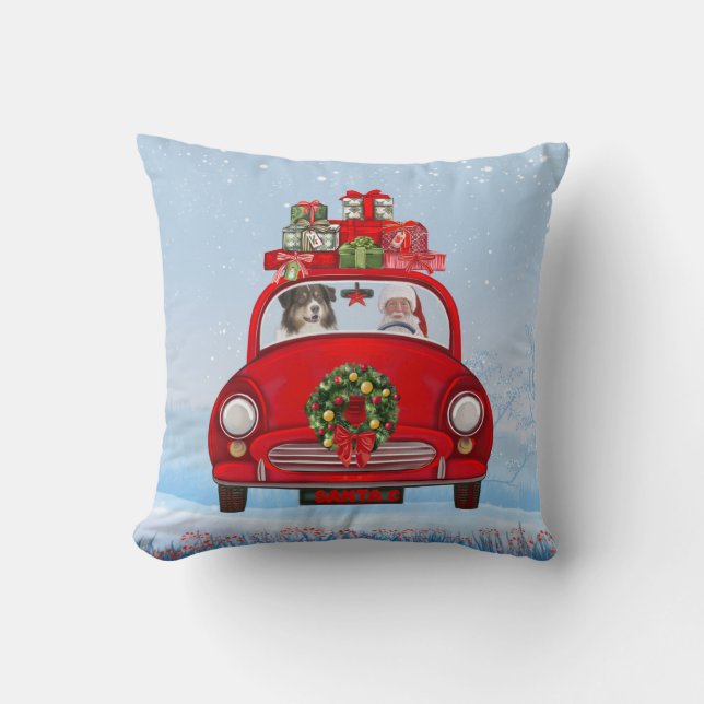 Australische herderhond in auto met kerstman kussen (Voorkant)