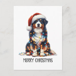 Australische herdershond gewikkeld in kerstlicht feestdagenkaart