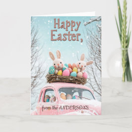 Auto en twee konijnen vol met paaseieren feestdagen kaart