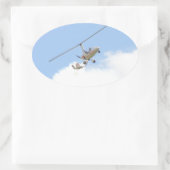 Autogyro in vlucht ovale sticker (Tas)