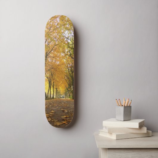 Autumn path with yellow trees and fallen leaves persoonlijk skateboard (Muurkunst)