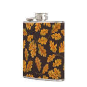 Autumnal eikenbladeren op donkerbruin heupfles (Links)