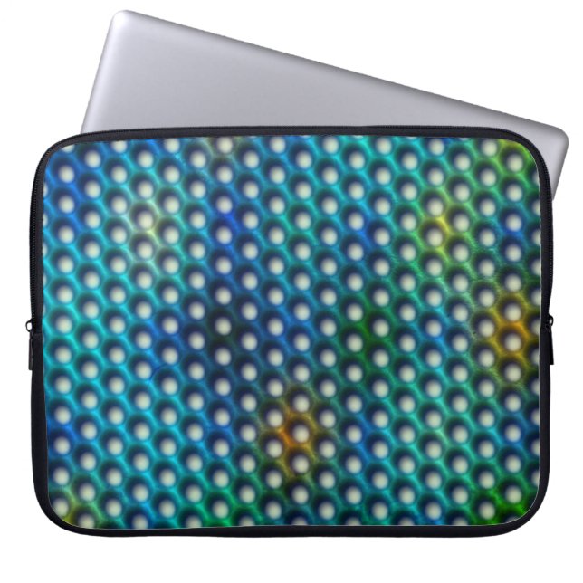 azul esverdeada com círculos que parecem furos laptop sleeve (Voorkant)