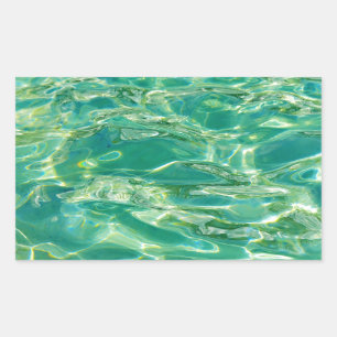 Azurblauw water onder heldere middagzon rechthoekige sticker