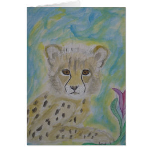 baby cheetah en bloem