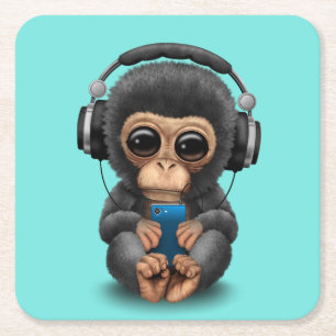 Baby chimp met hoofdtelefoon en mobiele telefoon kartonnen onderzetters