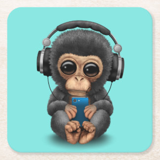 Baby chimp met hoofdtelefoon en mobiele telefoon kartonnen onderzetters