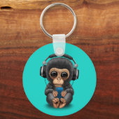 Baby chimp met hoofdtelefoon en mobiele telefoon sleutelhanger (Voorkant)
